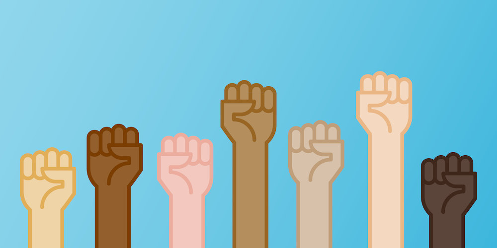 fist raised in solidarity, multiple skin colors