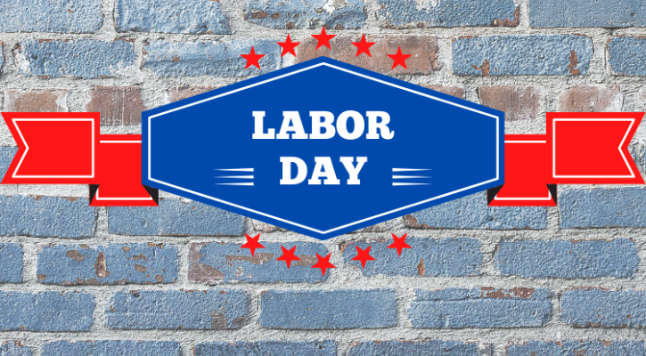brick wall with words "labor day" in overlying banner