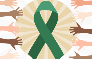 hands reaching for green ribbon